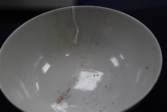A Chinese famille rose dragon and phoenix bowl, Jiaqing seal mark, late 19th / early 20th century, diam. 21cm, broken and repaired